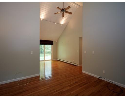37 Stony Hollow Road Tiverton, RI 02878 - Photo 18 of 30 an empty room with wooden floor and windows