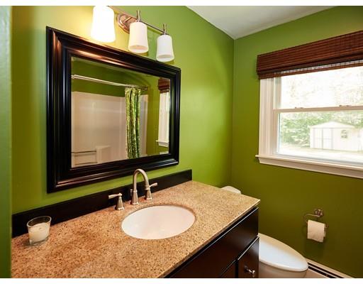 37 Stony Hollow Road Tiverton, RI 02878 - Photo 23 of 30 a bathroom with a granite countertop sink and a mirror