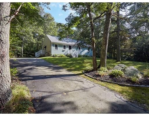 37 Stony Hollow Road Tiverton, RI 02878 - Photo 5 of 30 a view of a house with a yard and large trees