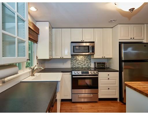 37 Stony Hollow Road Tiverton, RI 02878 - Photo 8 of 30 a kitchen with appliances a sink and cabinets