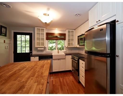 37 Stony Hollow Road Tiverton, RI 02878 - Photo 9 of 30 a kitchen with stainless steel appliances granite countertop a stove a sink and a microwave