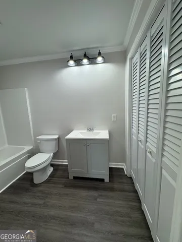 a bathroom with a sink and a toilet
