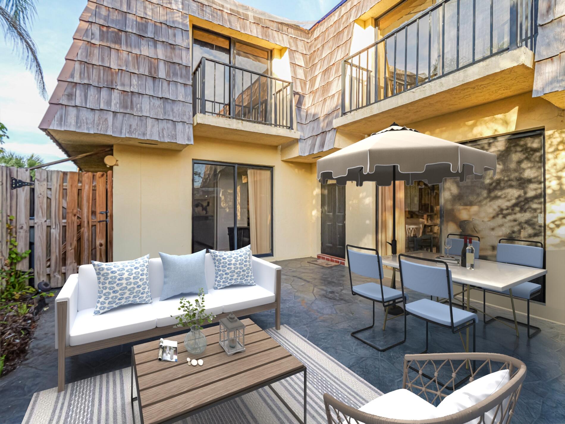 a building outdoor space with patio furniture