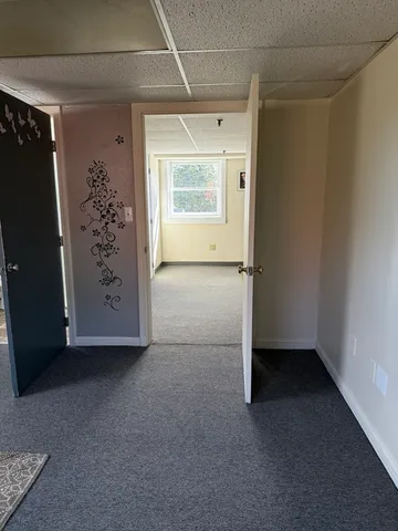 an empty room with windows