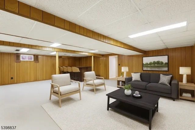 an empty room with closet and mirrors