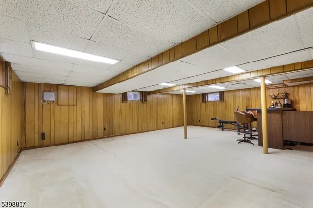 a bathroom with a sink mirror vanity and toilet