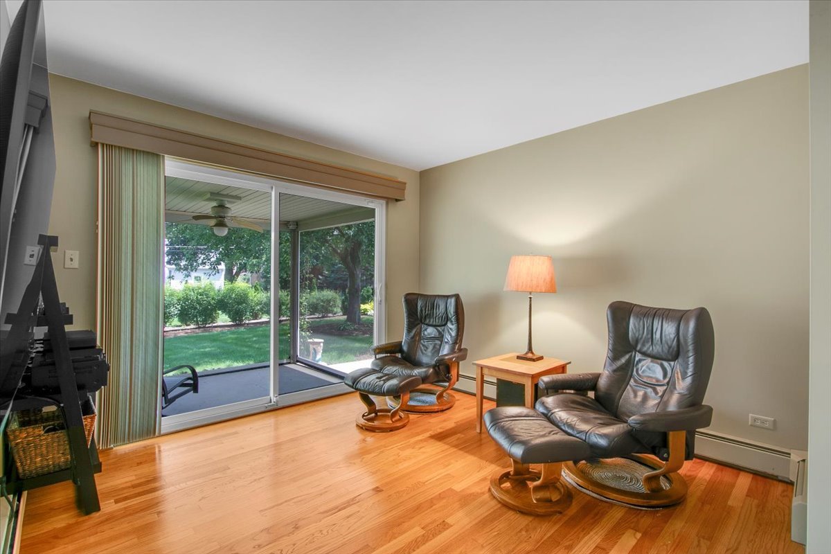 443 Lombard Road Itasca, IL 60143 - Photo 13 of 43 a view of a workspace with furniture and a window