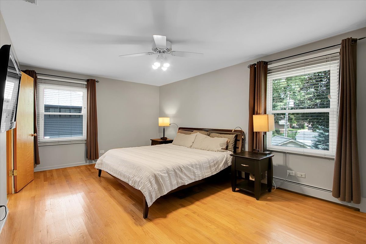 443 Lombard Road Itasca, IL 60143 - Photo 17 of 43 a bedroom with a bed and window