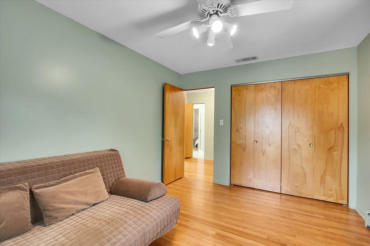 443 Lombard Road Itasca, IL 60143 - Photo 24 of 43 a living room with furniture and wooden floor
