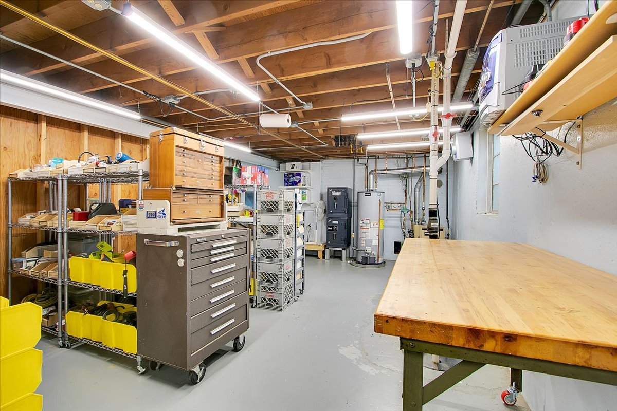 443 Lombard Road Itasca, IL 60143 - Photo 32 of 43 a bed room with a bed and a table