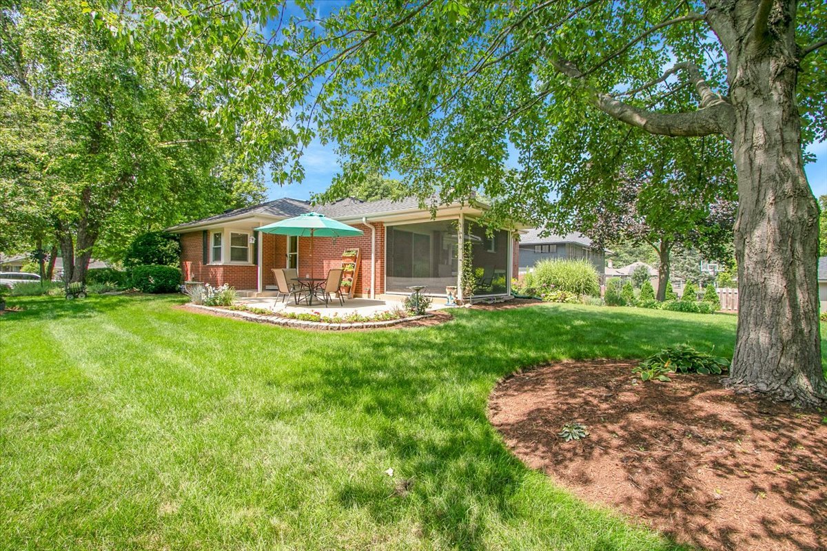 443 Lombard Road Itasca, IL 60143 - Photo 35 of 43 a front view of house with yard and green space