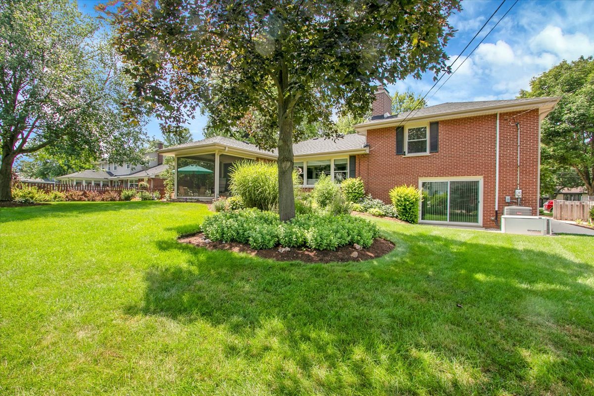 443 Lombard Road Itasca, IL 60143 - Photo 37 of 43 a front view of house with yard and green space
