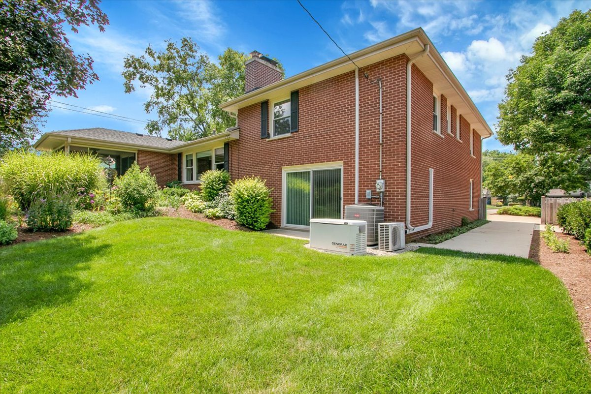 443 Lombard Road Itasca, IL 60143 - Photo 38 of 43 a view of a house with a yard and sitting area