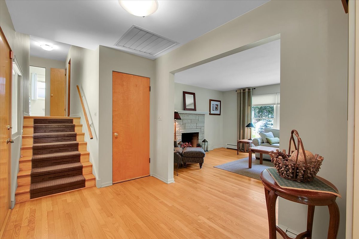 443 Lombard Road Itasca, IL 60143 - Photo 6 of 43 a view of a livingroom with furniture and staircase