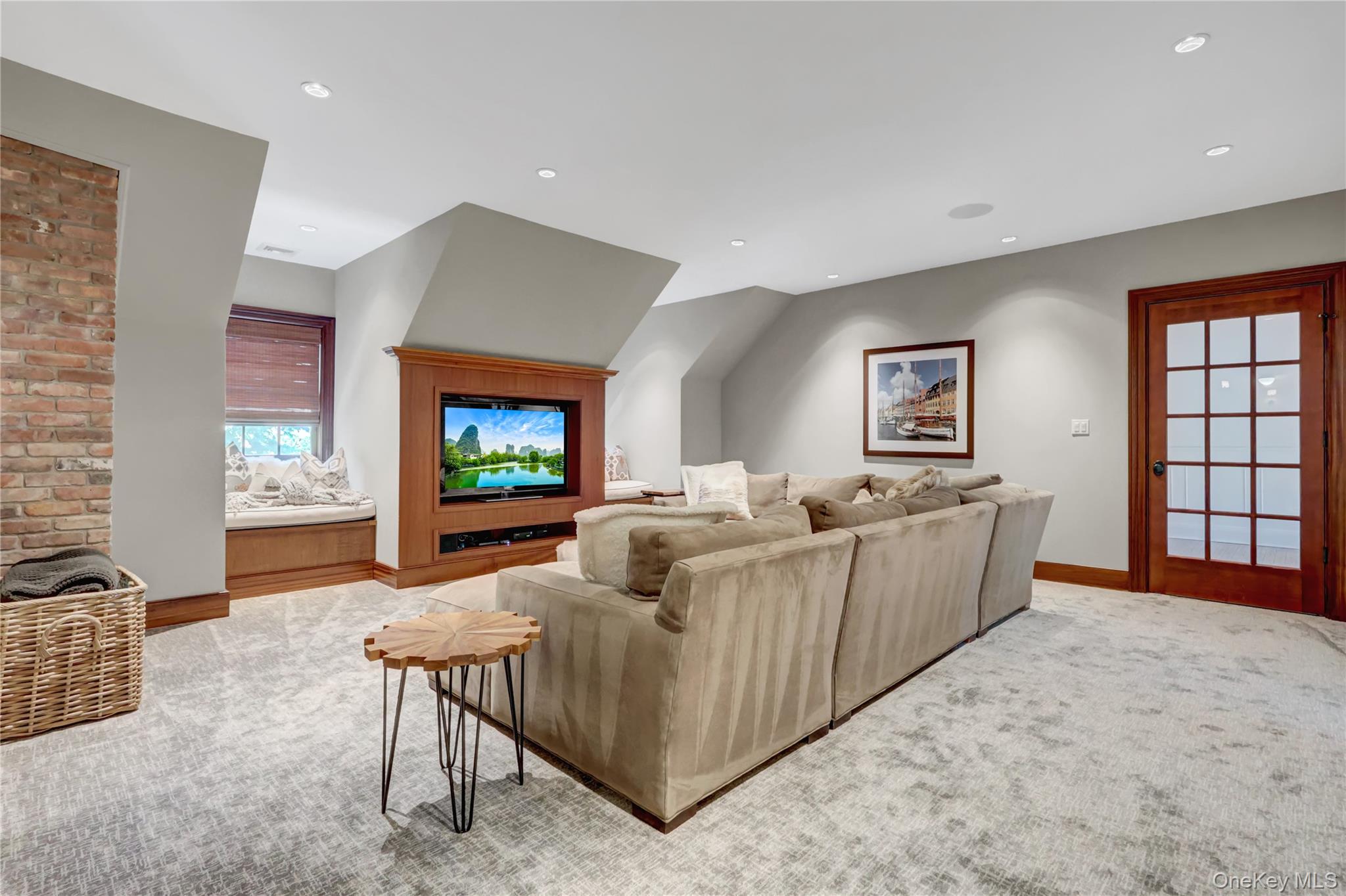 63 Dyke Road Setauket, NY 11733 - Photo 29 of 49 a living room with furniture a flat screen tv and a couch