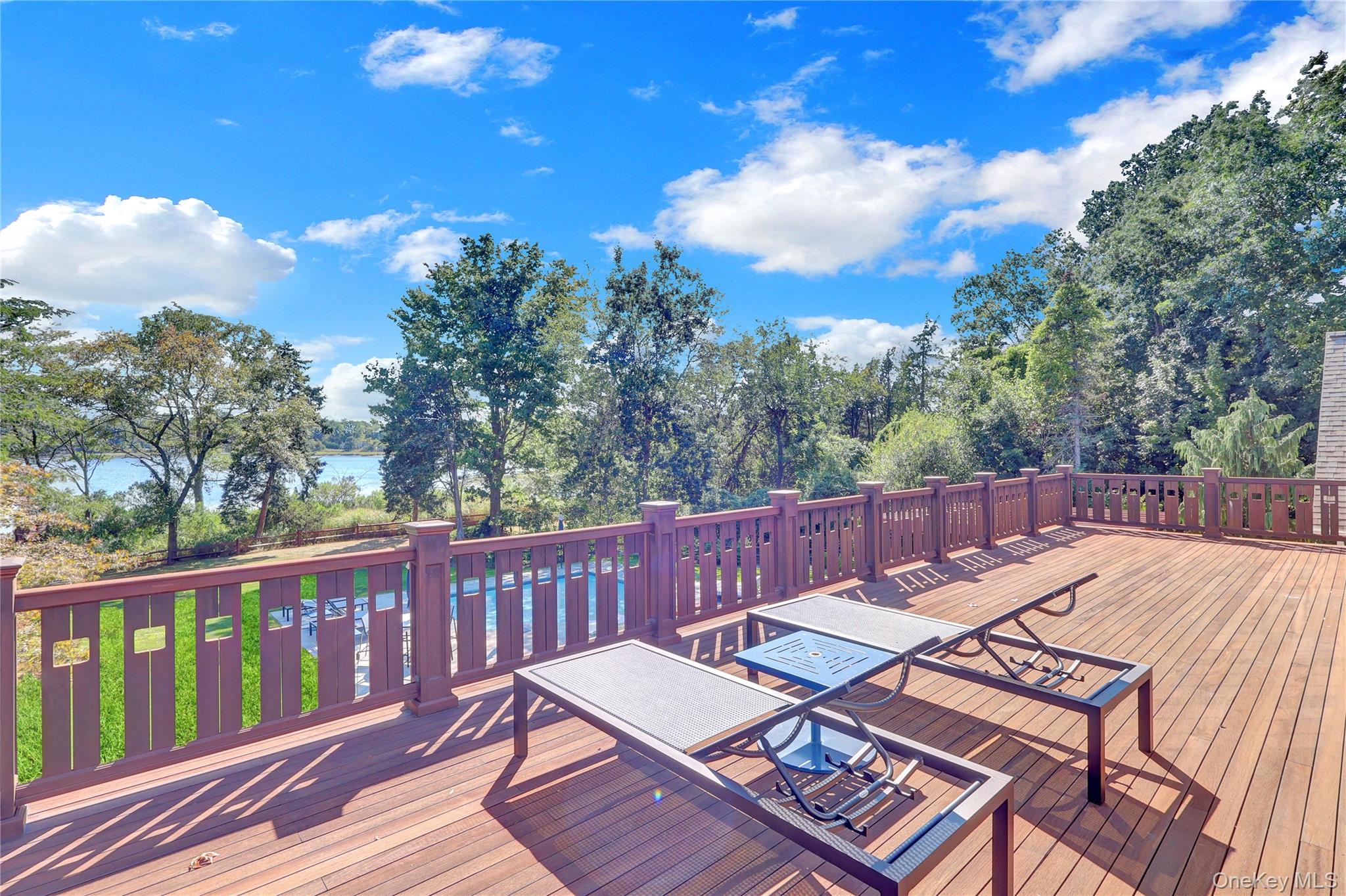 63 Dyke Road Setauket, NY 11733 - Photo 45 of 49 a view of a patio with wooden floor