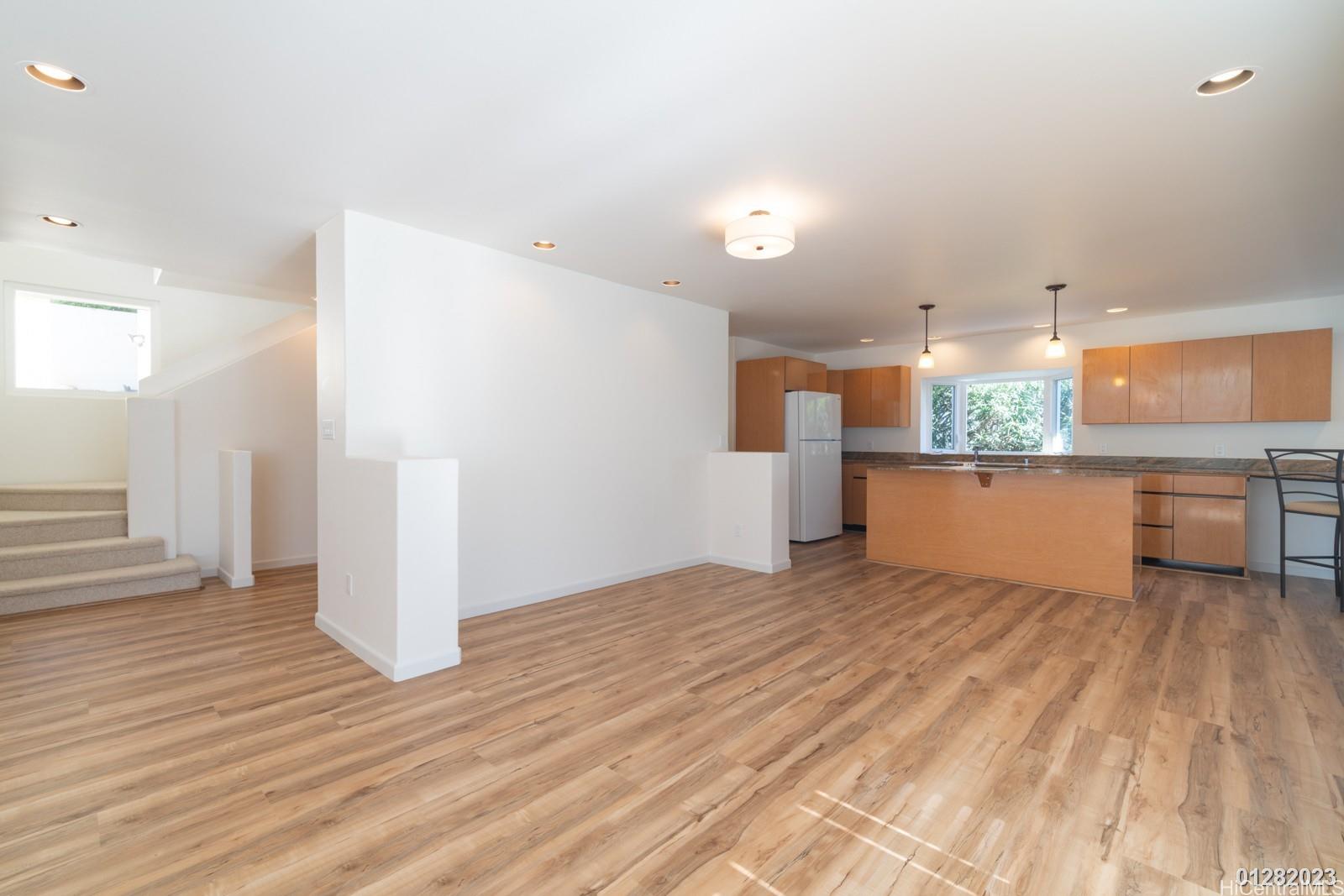824 Ikena Circle Honolulu, HI 96821 - Photo 12 of 25 a view of a kitchen with a sink and an empty room