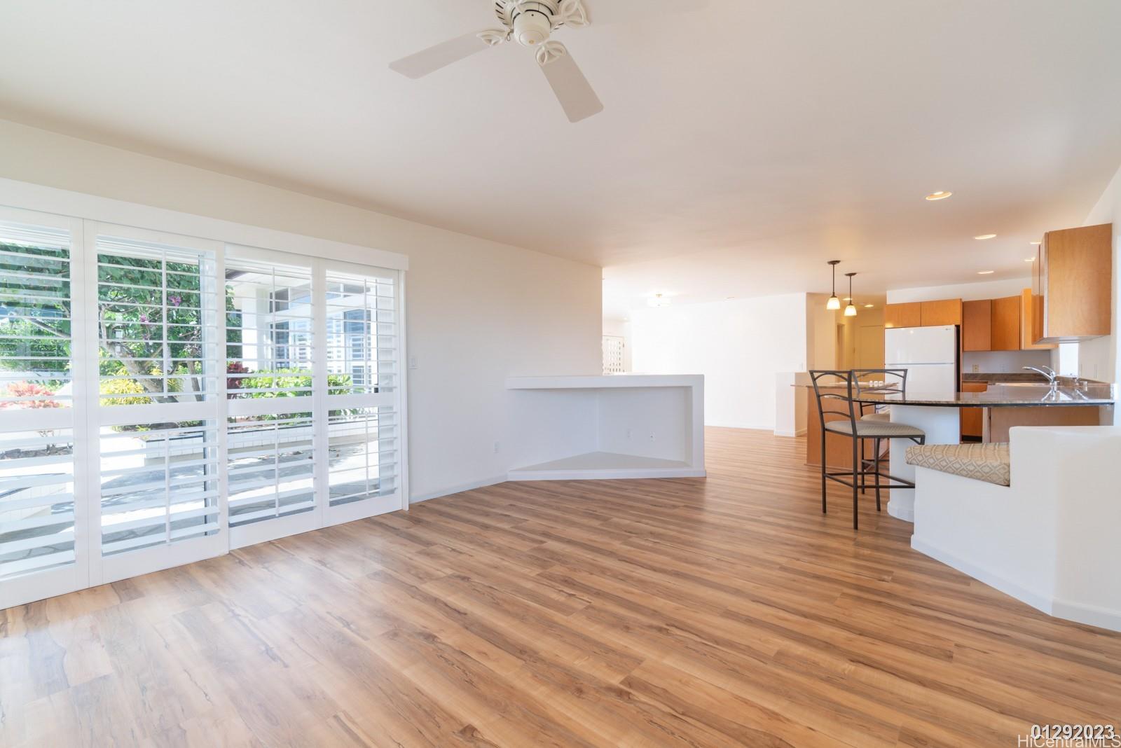 824 Ikena Circle Honolulu, HI 96821 - Photo 16 of 25 a view of kitchen with furniture and wooden floor