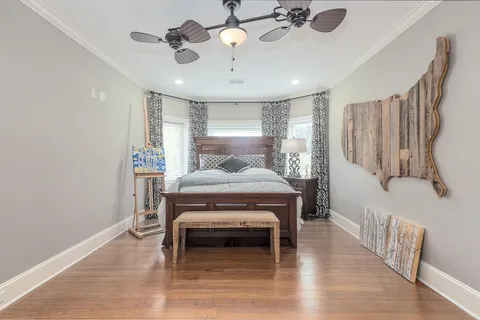 a view of a house with swimming pool and sitting area