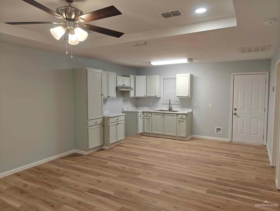 2736 Naples Street Weslaco, TX 78596 - Photo 3 of 14 a view of kitchen with wooden floor