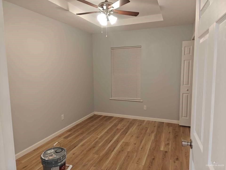 2736 Naples Street Weslaco, TX 78596 - Photo 8 of 14 a view of a room with rack on the wall and a window