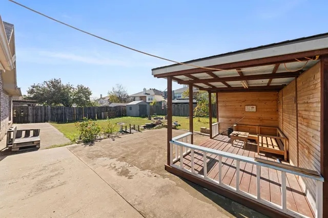 a view of a swimming pool with a patio