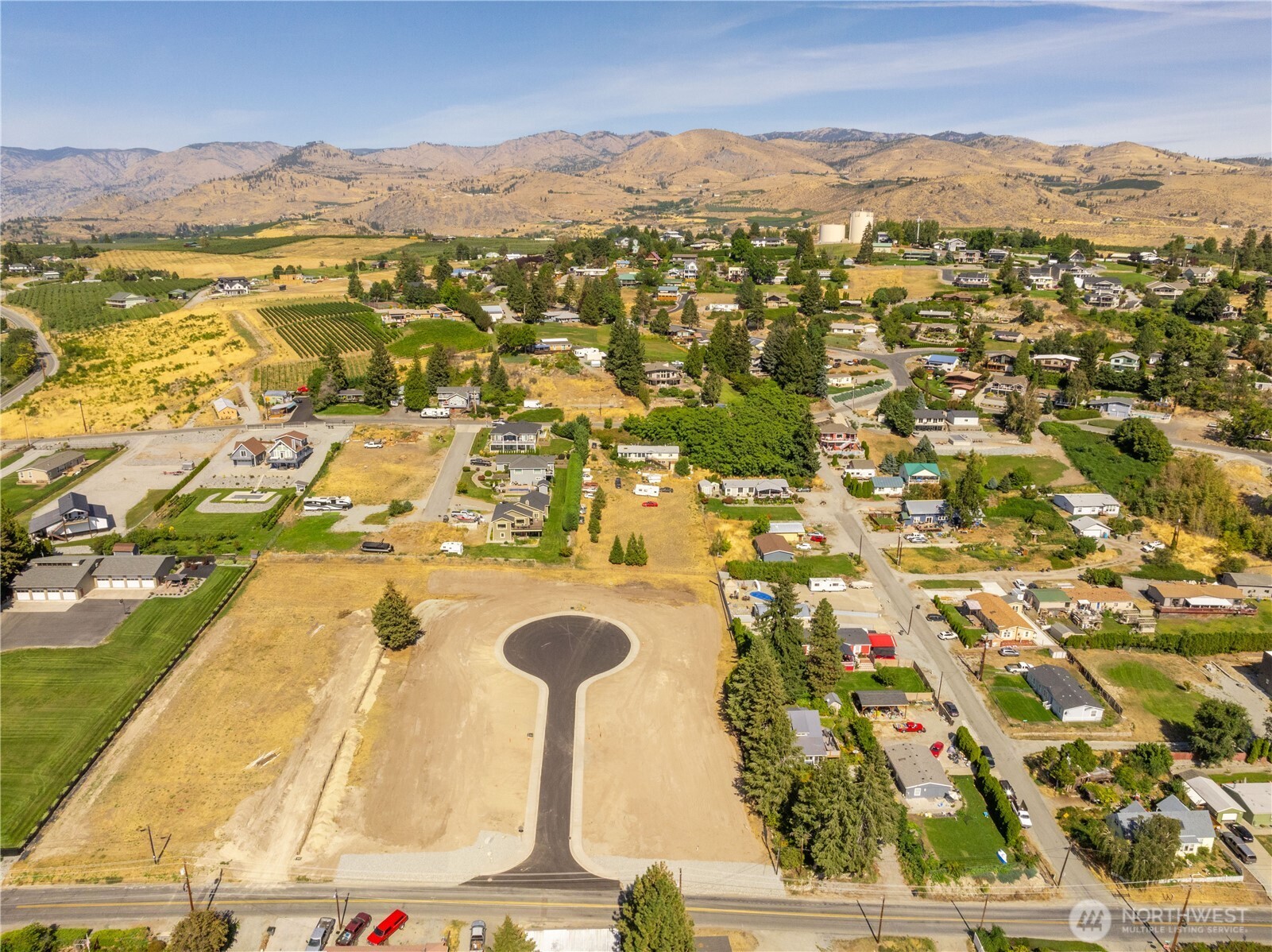 20 Indigo Lane Manson, WA 98831 - Photo 11 of 22 an aerial view of residential house with yard