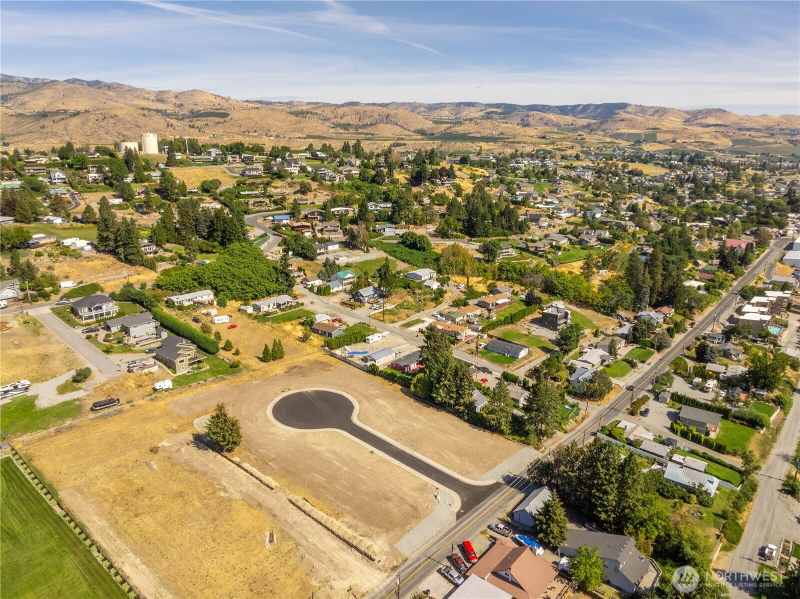 20 Indigo Lane Manson, WA 98831 - Photo 12 of 22 an aerial view of residential houses with outdoor space