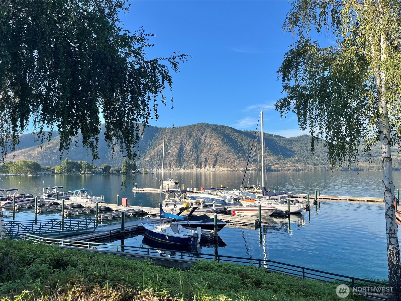 20 Indigo Lane Manson, WA 98831 - Photo 21 of 22 a view of a lake with outdoor seating