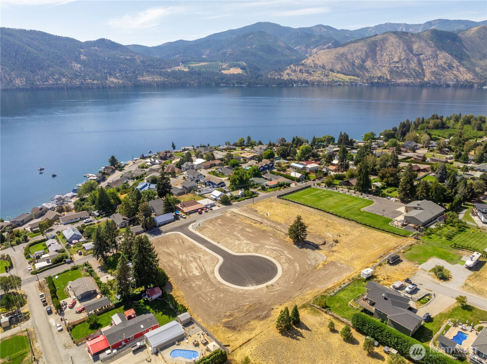 20 Indigo Lane Manson, WA 98831 - Photo 8 of 22 an aerial view of a house with a garden