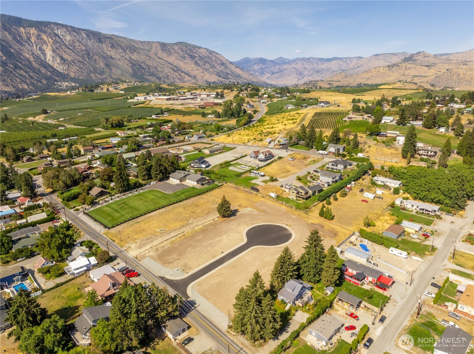 20 Indigo Lane Manson, WA 98831 - Photo 10 of 22 an aerial view of residential houses with outdoor space