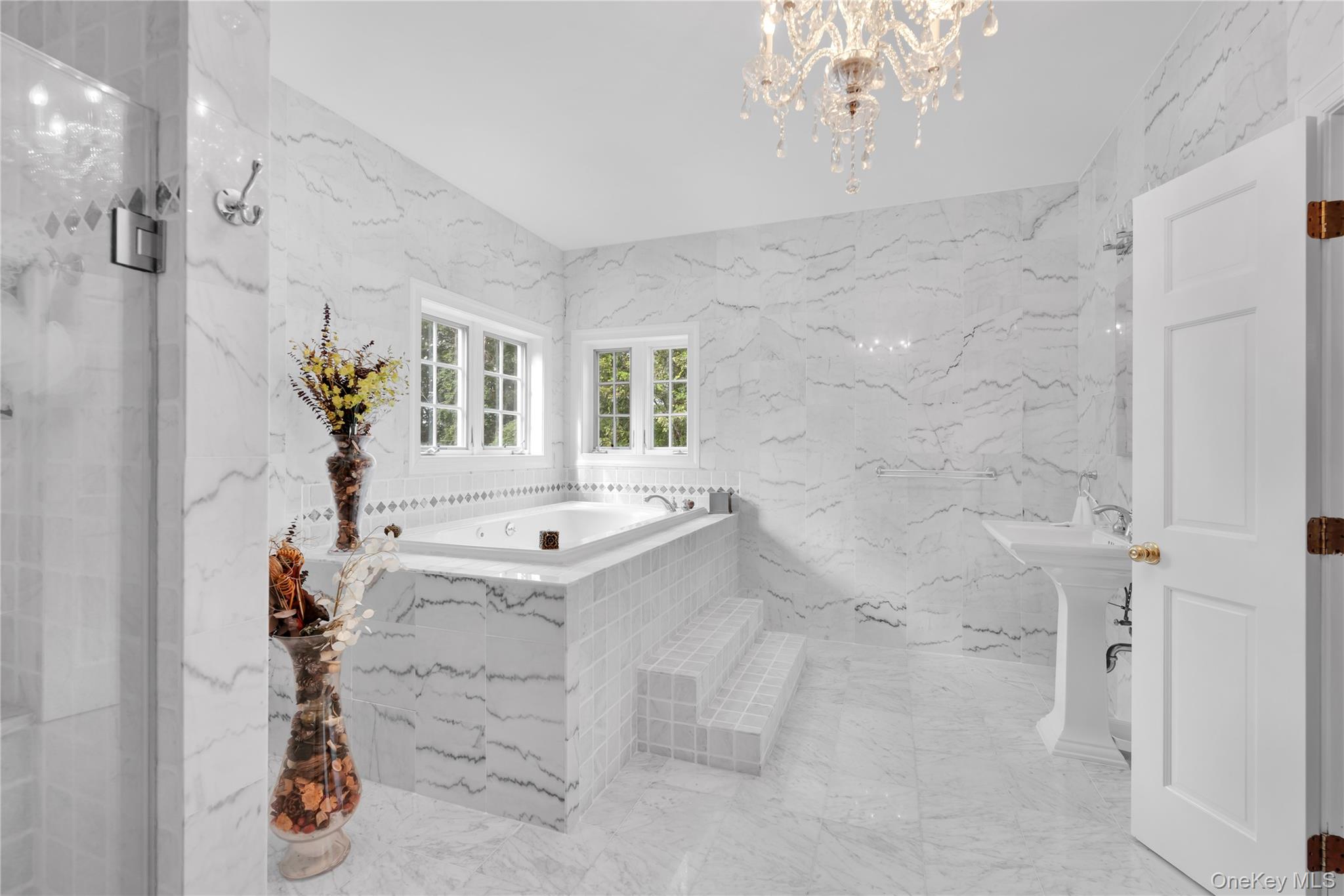 59 Orchard Hill Road Katonah, NY 10536 - Photo 14 of 27 a bathroom with a sink and mirror