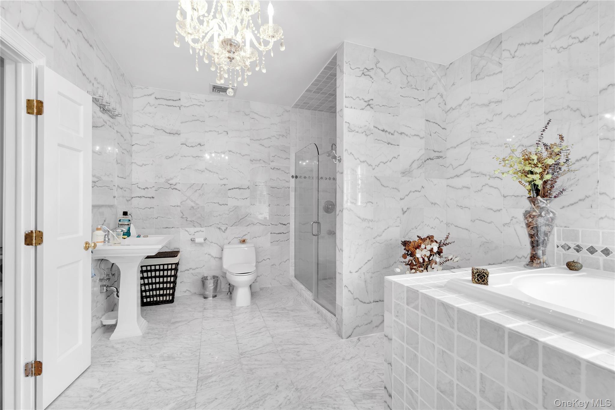 59 Orchard Hill Road Katonah, NY 10536 - Photo 15 of 27 a bathroom with a sink a toilet and shower