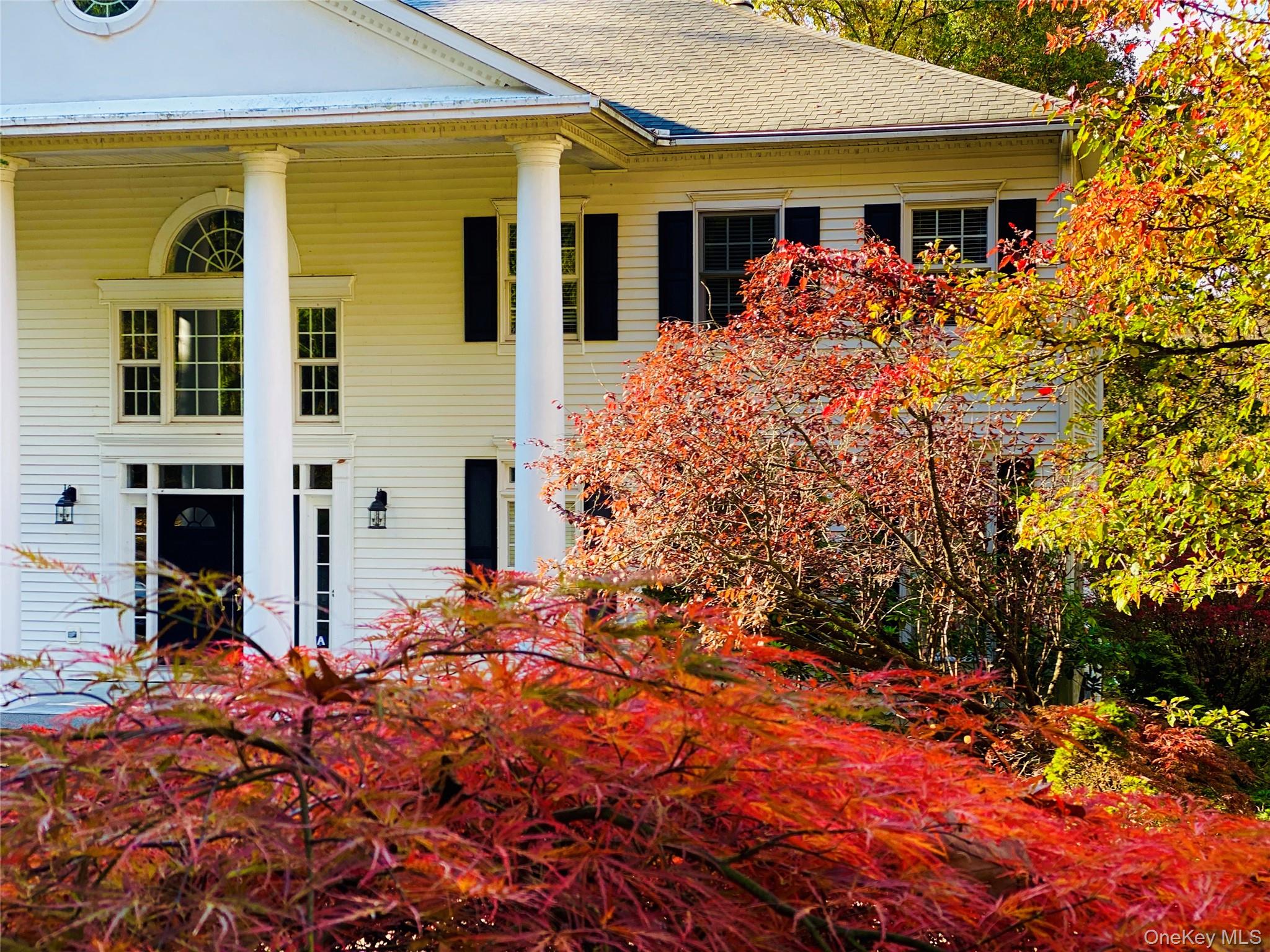 59 Orchard Hill Road Katonah, NY 10536 - Photo 25 of 27 front view of house with a yard