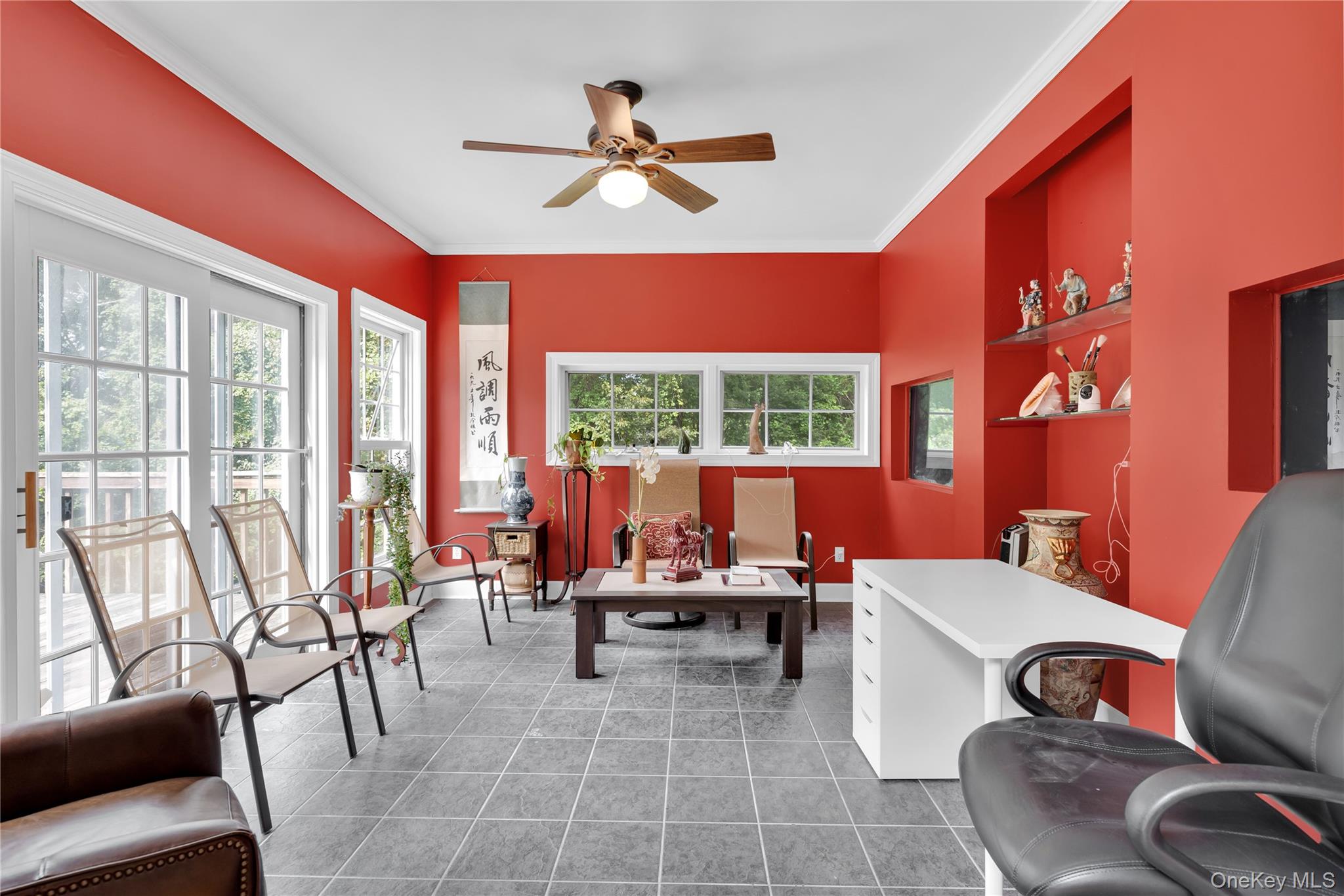59 Orchard Hill Road Katonah, NY 10536 - Photo 10 of 27 a living room with furniture and floor to ceiling windows