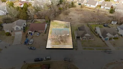 an aerial view of residential house with outdoor space