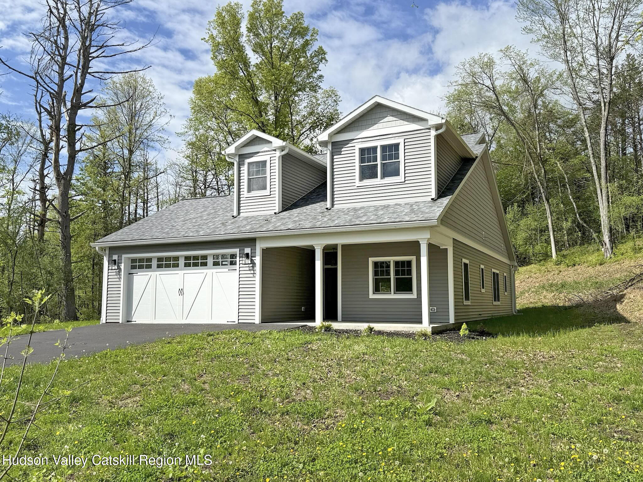 1980 Sleepy Hollow Road Athens, NY 12015 - Photo 1 of 40 a front view of a house with garden