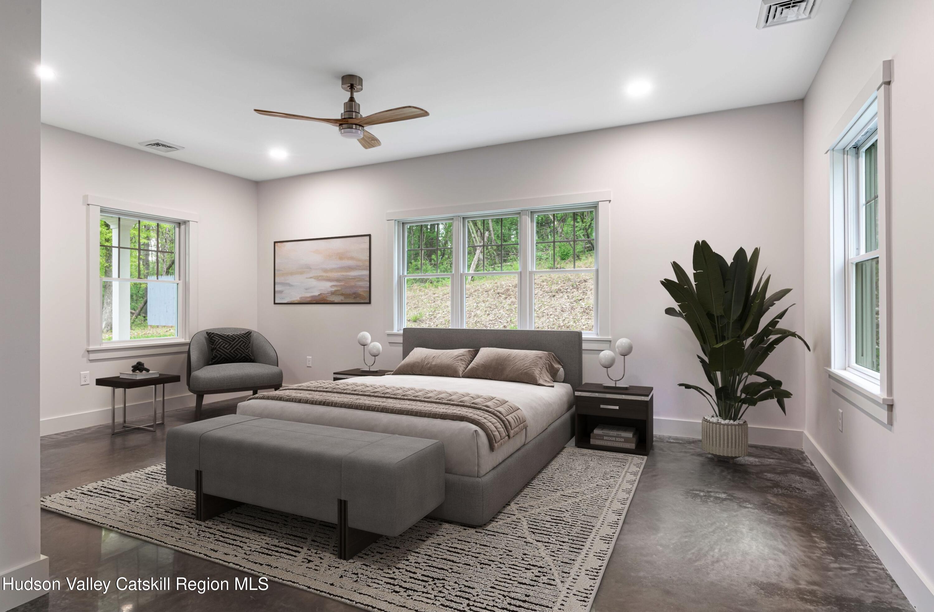 1980 Sleepy Hollow Road Athens, NY 12015 - Photo 15 of 40 a bedroom with a large bed and a window