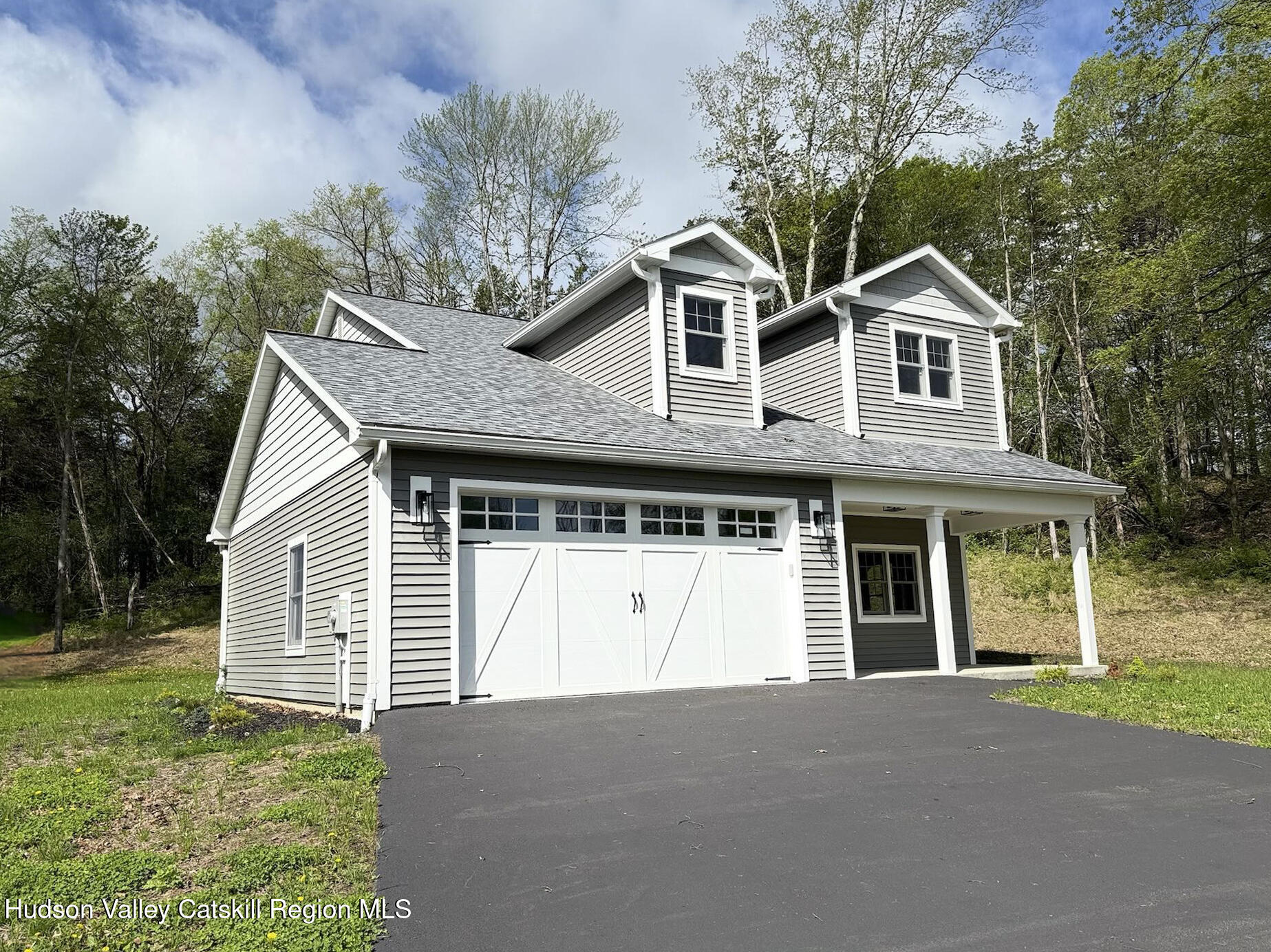 1980 Sleepy Hollow Road Athens, NY 12015 - Photo 30 of 40 a front view of a house with a yard and garage