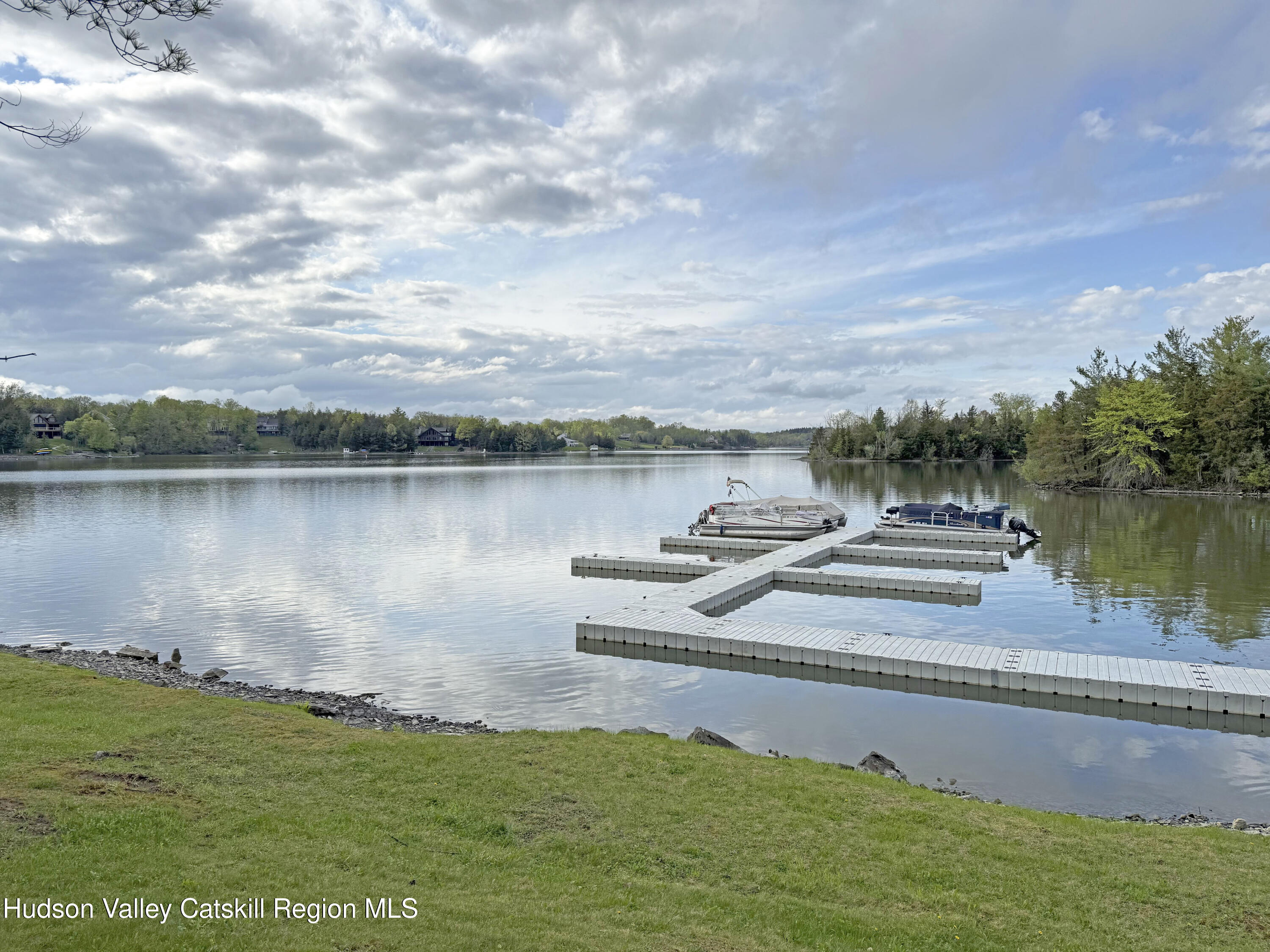 1980 Sleepy Hollow Road Athens, NY 12015 - Photo 34 of 40 a view of a lake with a big yard and large trees