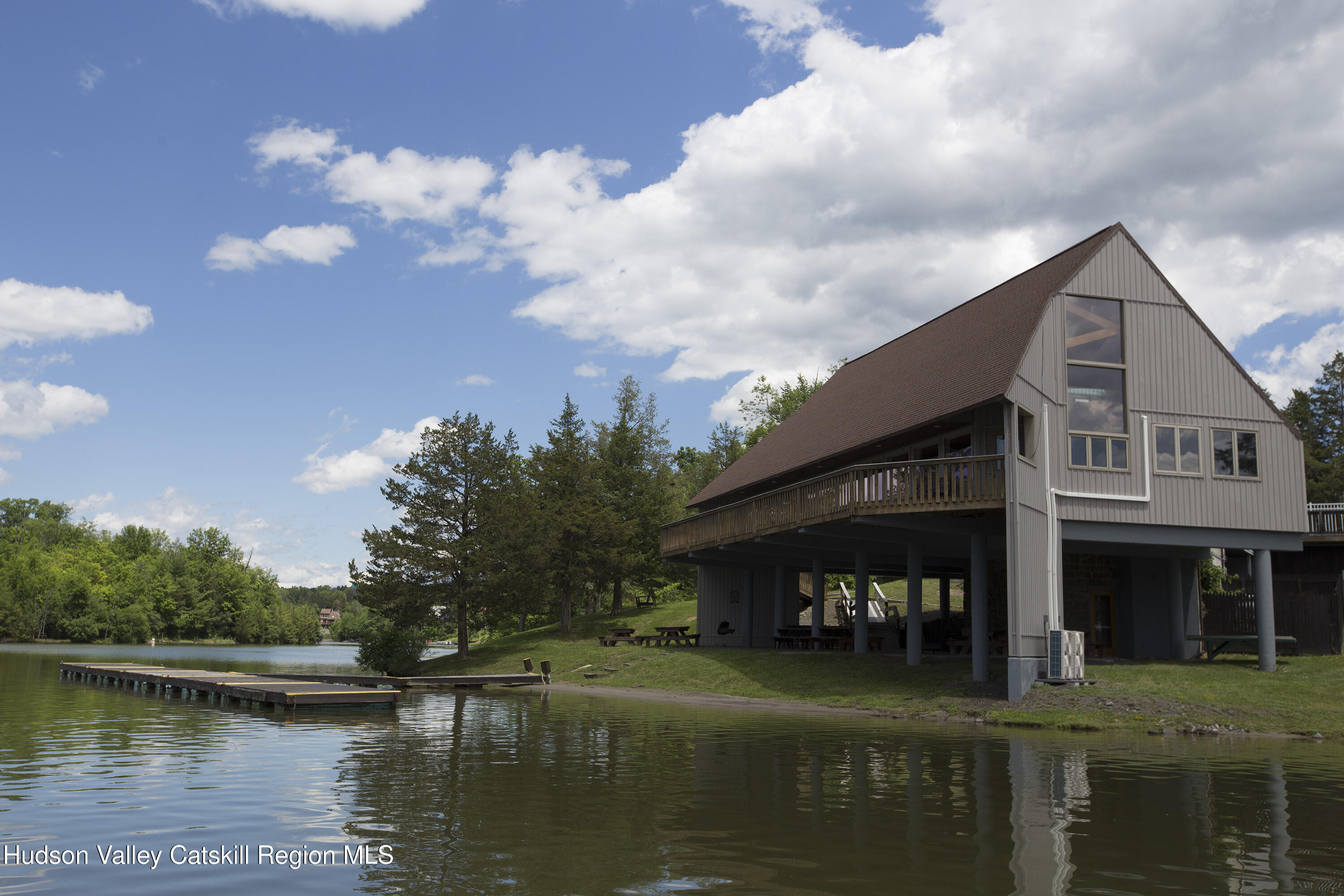 1980 Sleepy Hollow Road Athens, NY 12015 - Photo 38 of 40 a view of a lake with a big yard and large trees