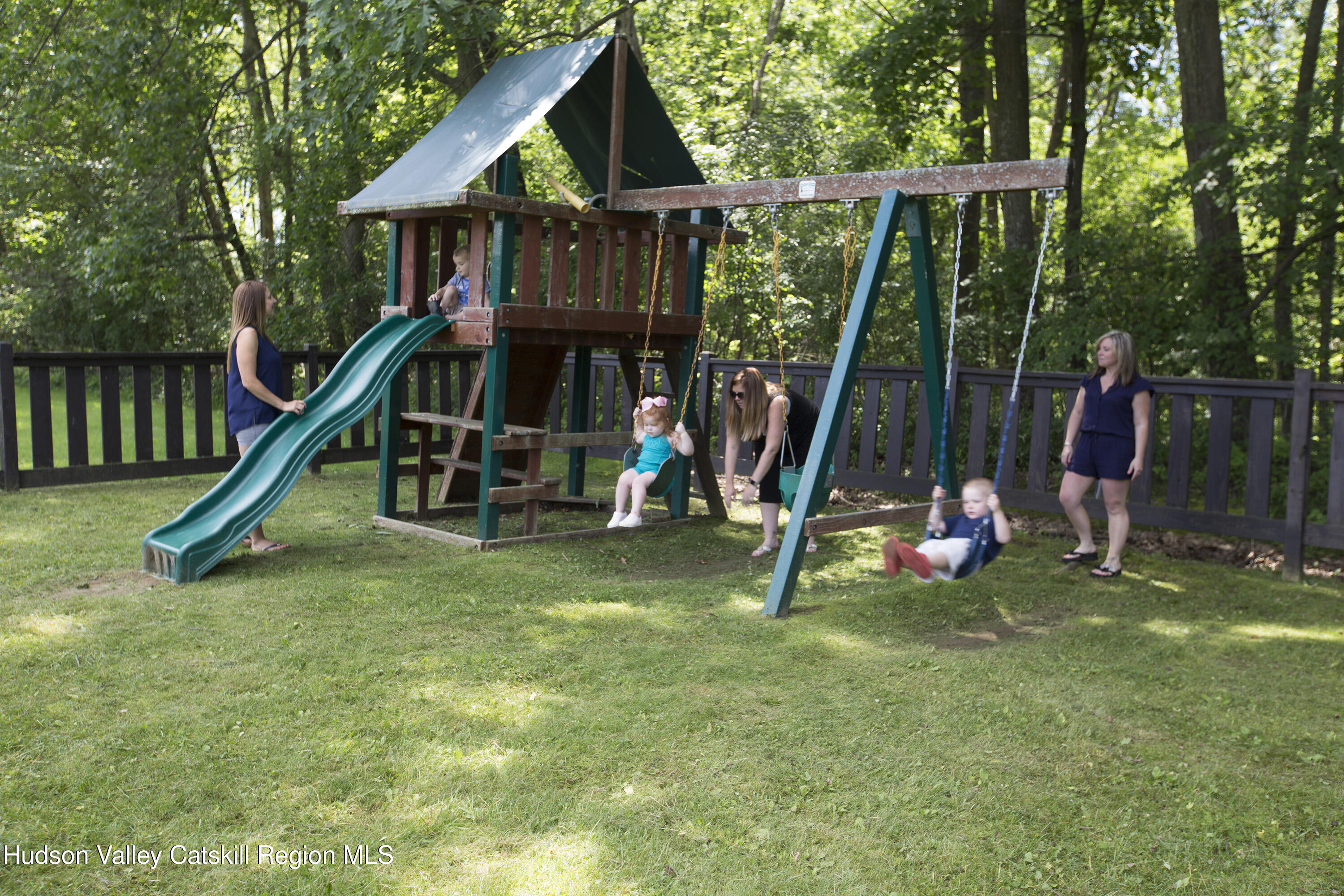 1980 Sleepy Hollow Road Athens, NY 12015 - Photo 39 of 40 a view of wooden deck with a slide and swing