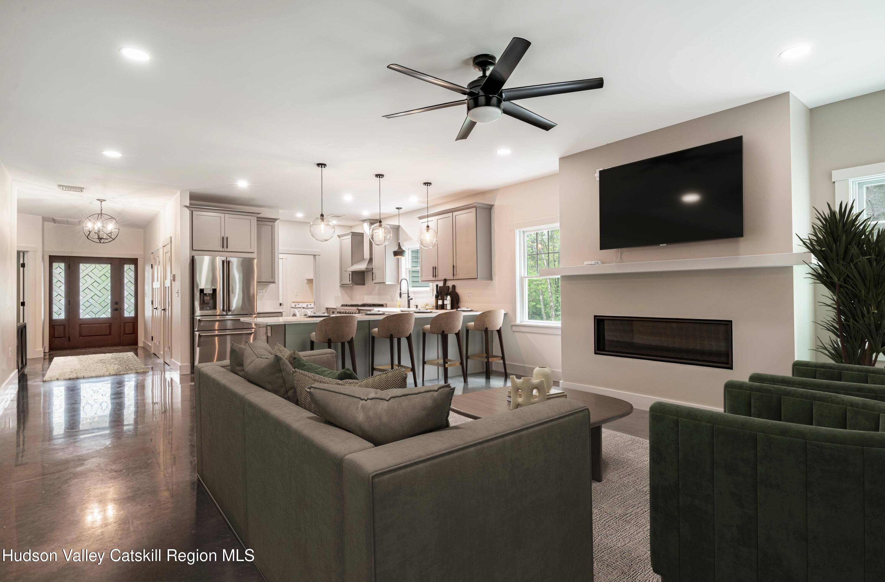 1980 Sleepy Hollow Road Athens, NY 12015 - Photo 4 of 40 a living room with furniture and a flat screen tv
