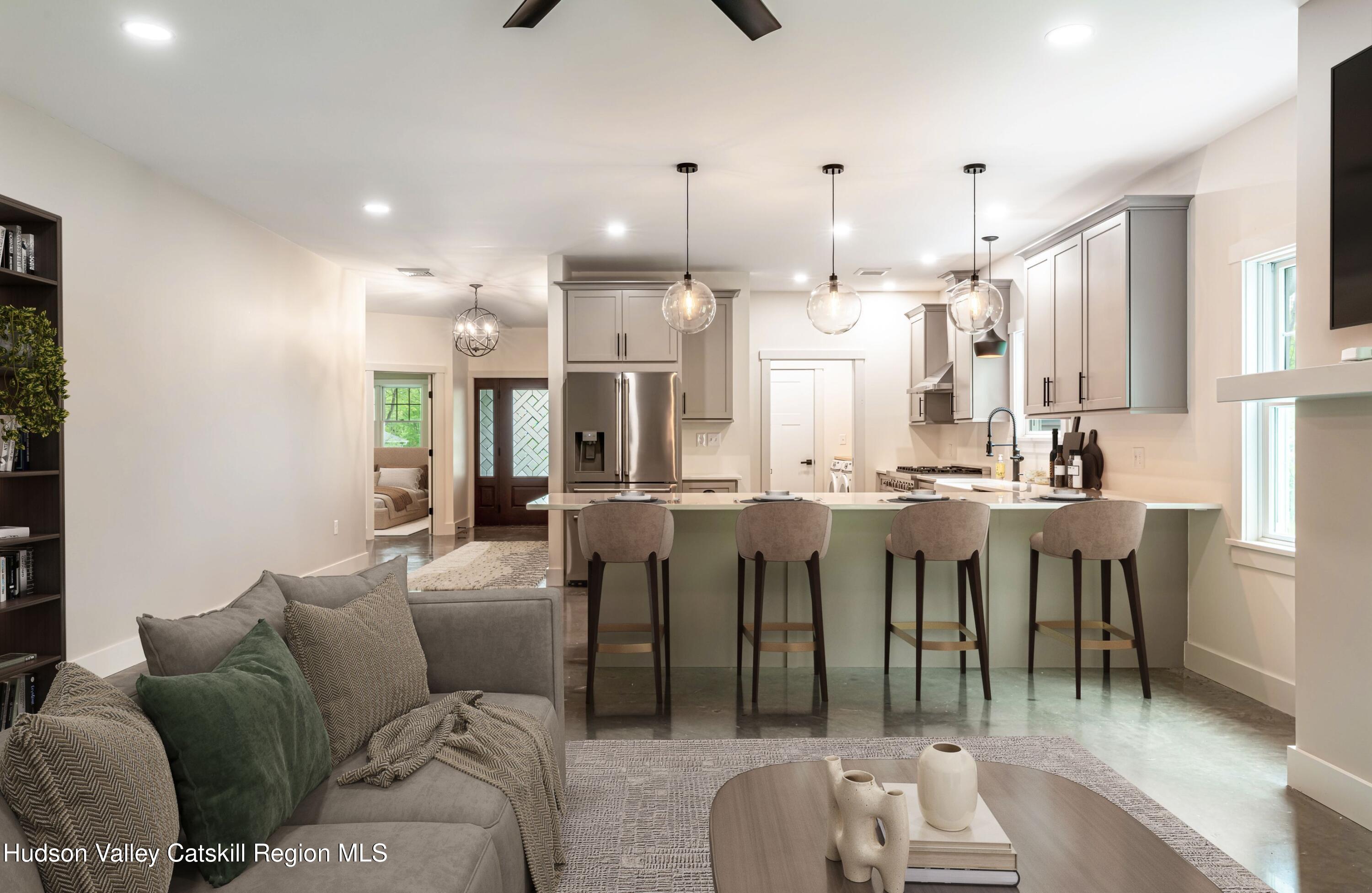 1980 Sleepy Hollow Road Athens, NY 12015 - Photo 7 of 40 a living room with lots of furniture and kitchen view