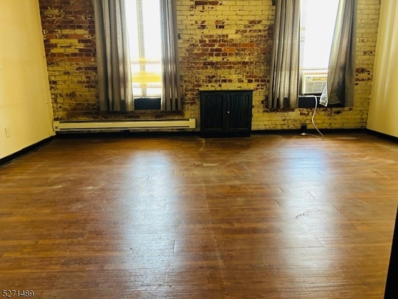 16 Walling Avenue, Unit 204 Sussex, NJ 07461 - Photo 1 of 2 a view of a room with wooden floor