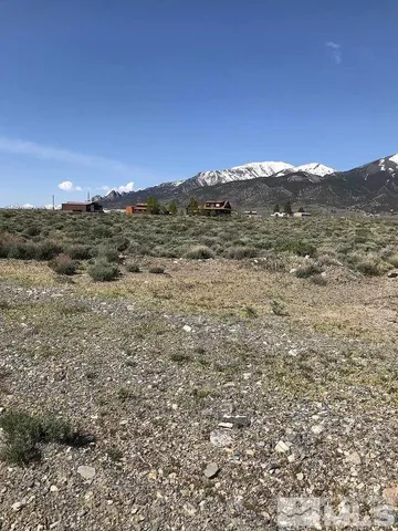 a view of mountain with sunset view