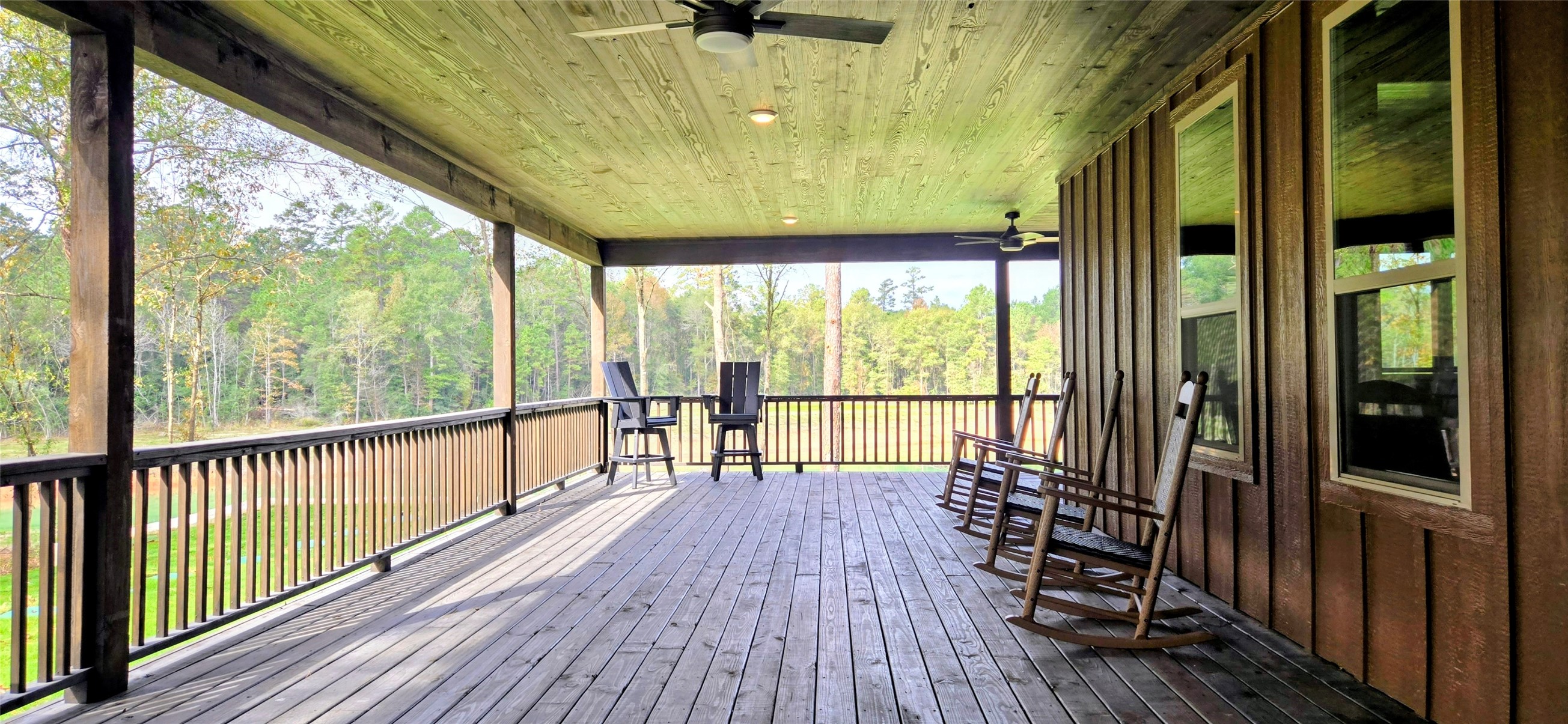 191 Heartland Road New Waverly, TX 77358 - Photo 13 of 15 a view of a balcony with wooden floor