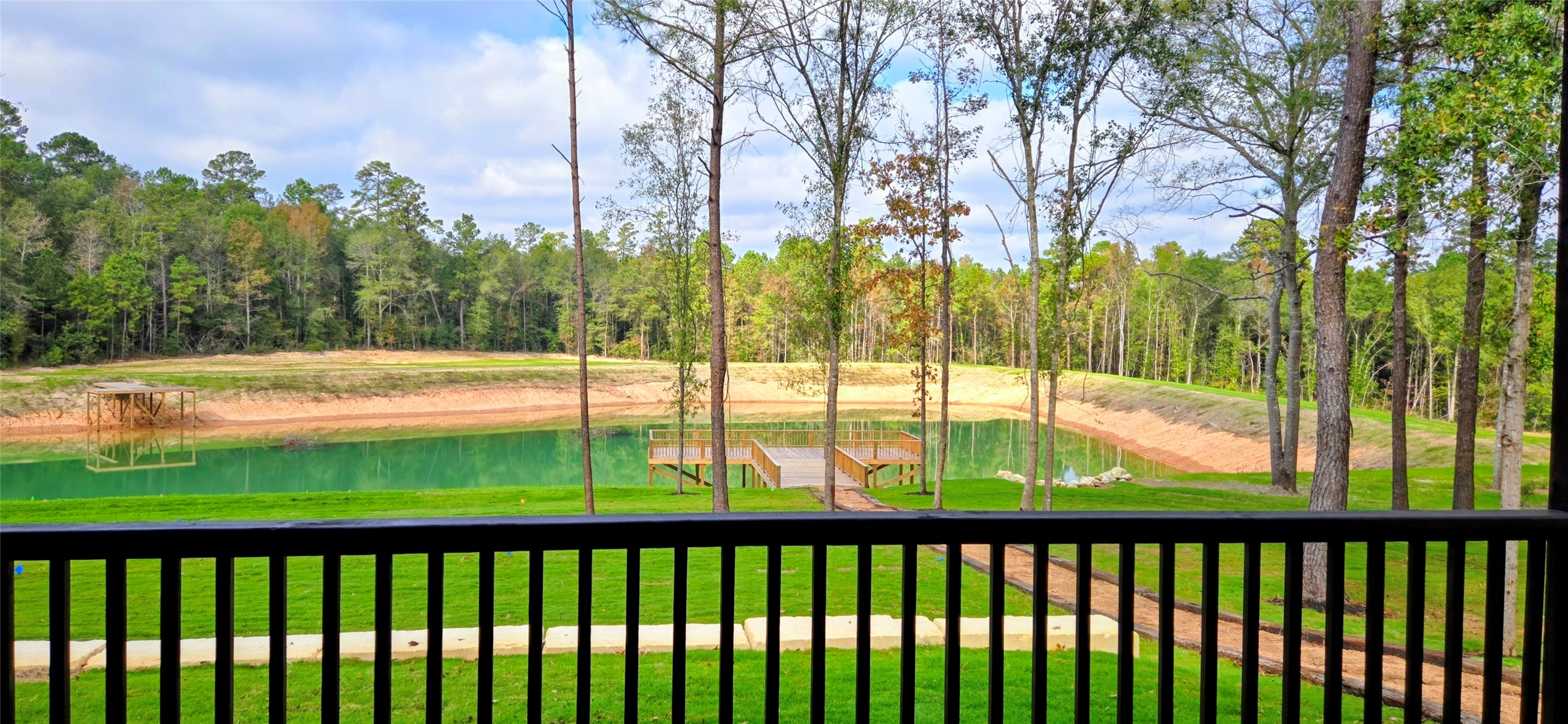 191 Heartland Road New Waverly, TX 77358 - Photo 14 of 15 a view of a balcony with lake view