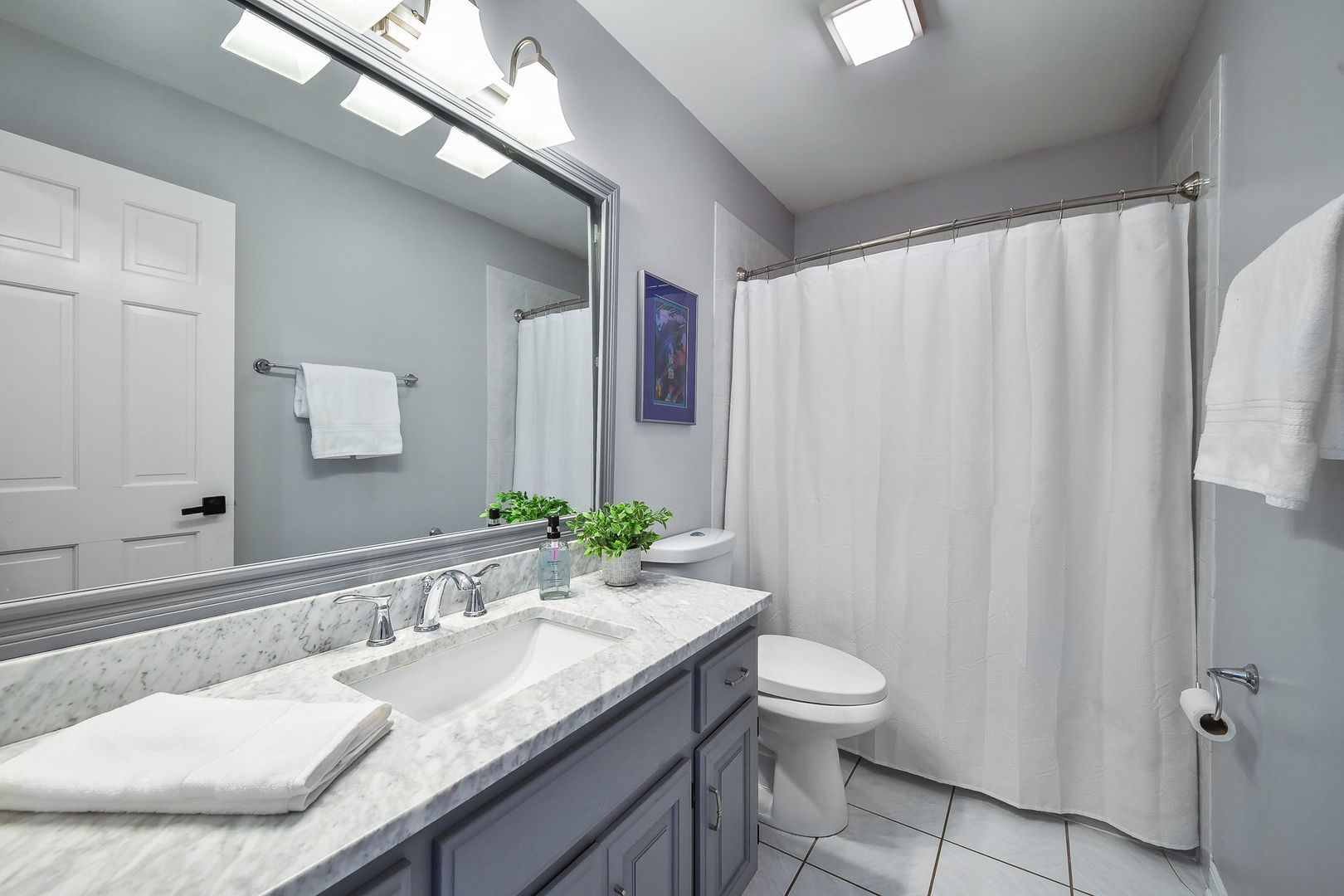 1206 Beckman Lane Batavia, IL 60510 - Photo 16 of 42 a bathroom with a granite countertop sink and a mirror