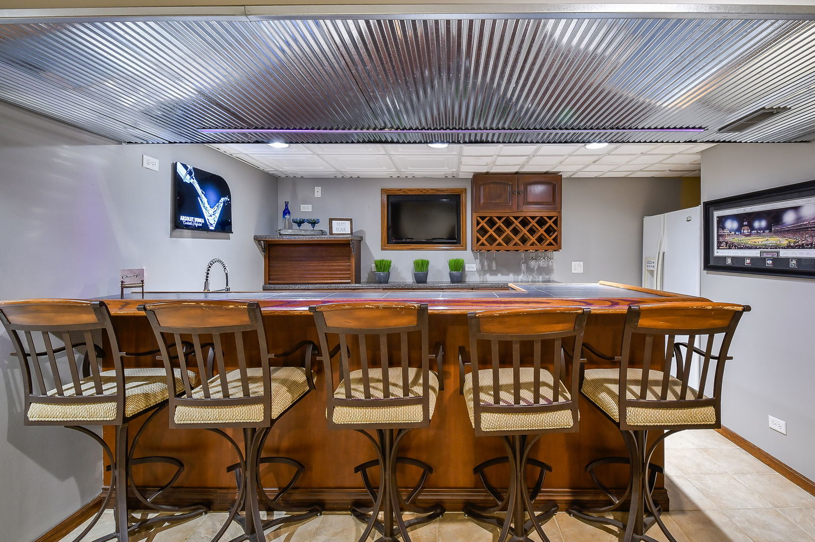 1206 Beckman Lane Batavia, IL 60510 - Photo 26 of 42 a kitchen with a table chairs and a wooden floor